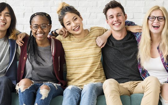 Teens sitting on a couch after group therapy