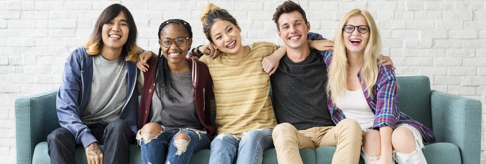 Teens sitting on a couch after group therapy